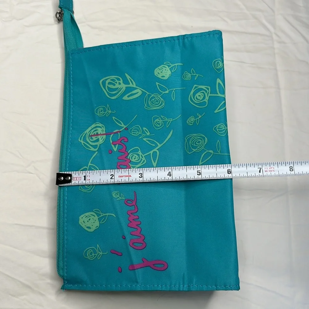 Lancôme Pink and Blue Floral Cosmetic Bag with Paris Text. 9” long x 6” tall.